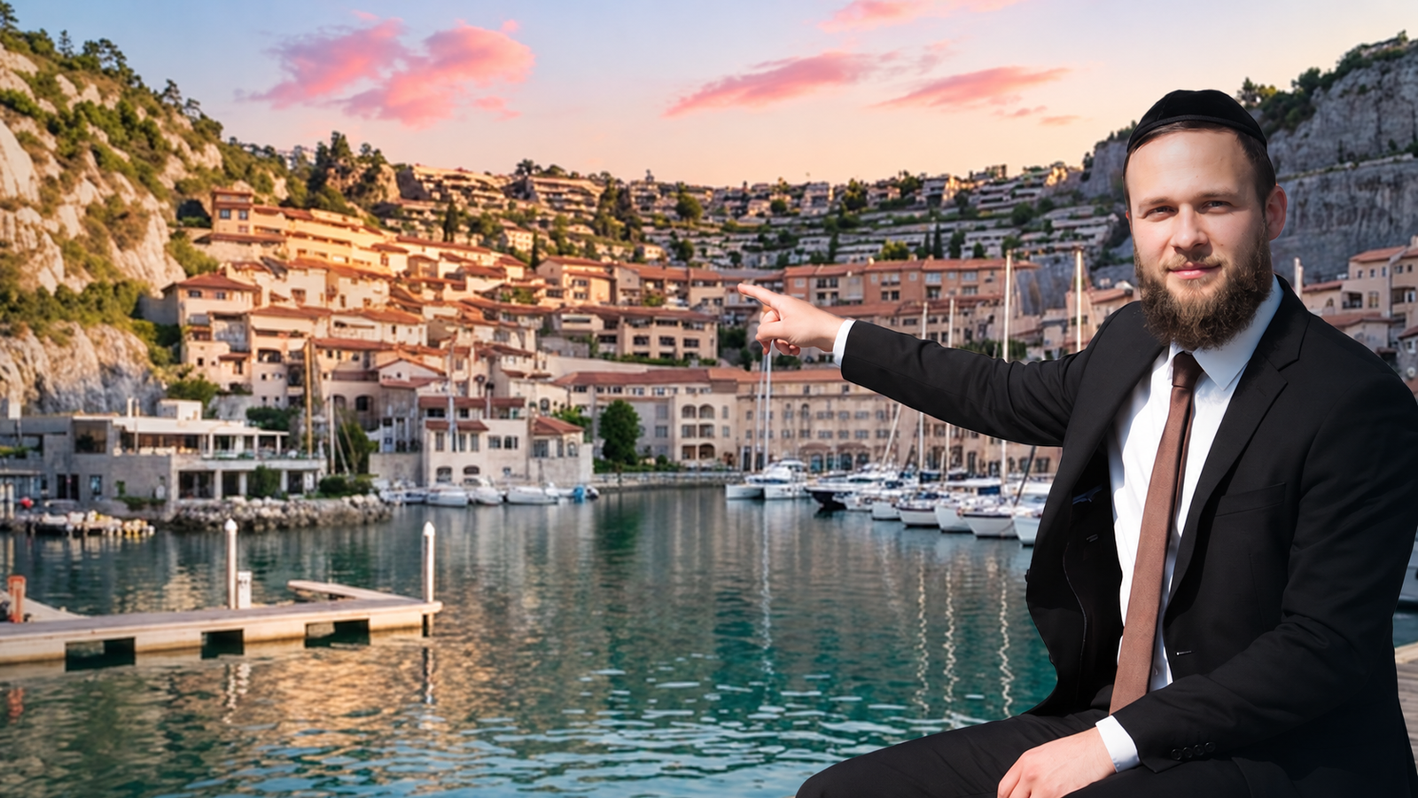 Rabbi Hillel Eisenberg beside a harbor during his travels